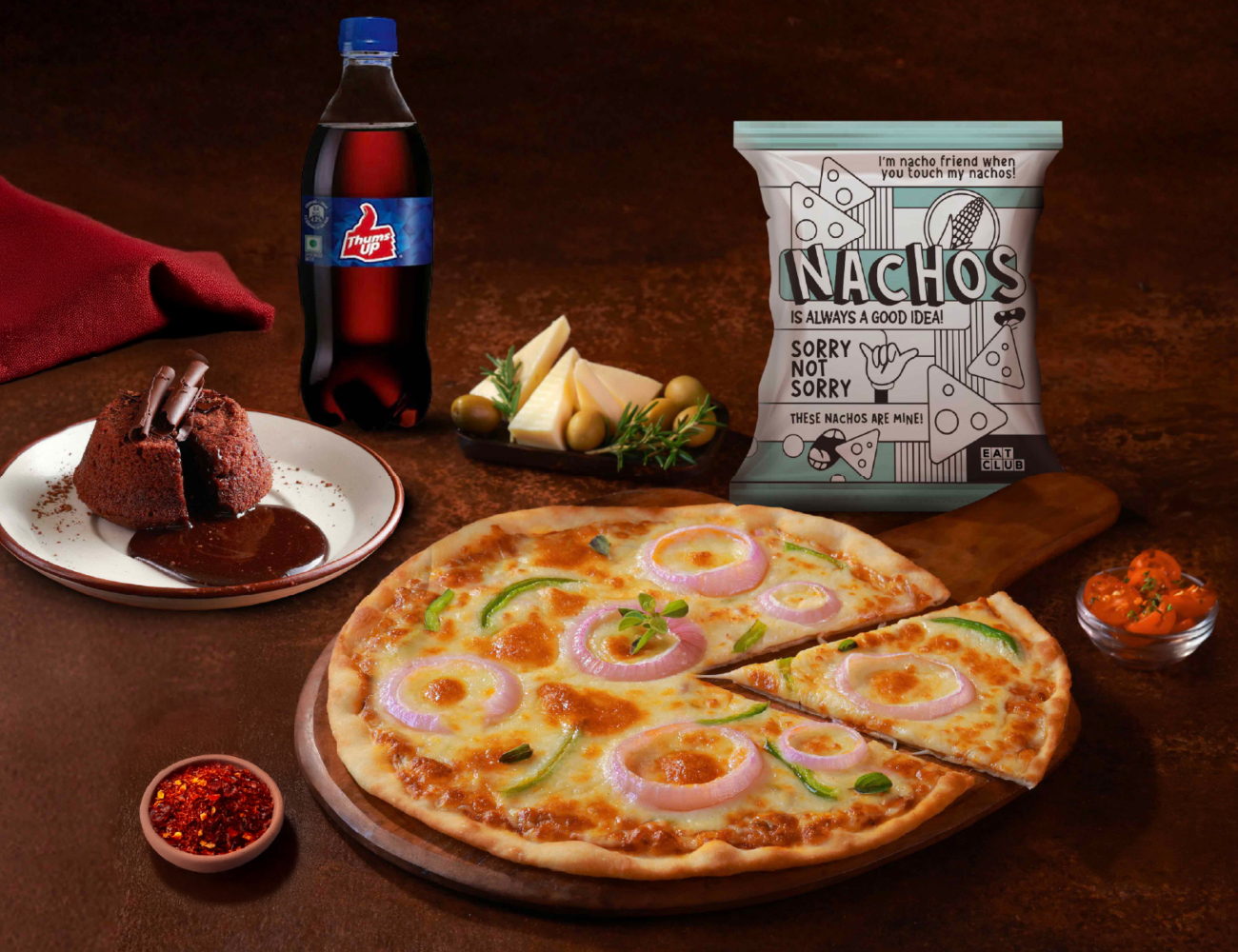 Earthy Veg Pizza [7" Regular]+ Chocolava+ Nachos+ Thums Up